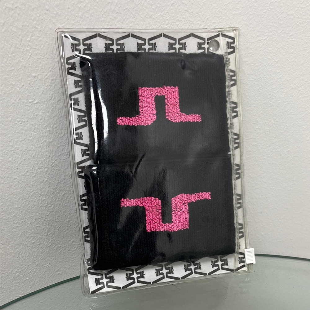 J. Lindeberg Black and Pink Wristbands